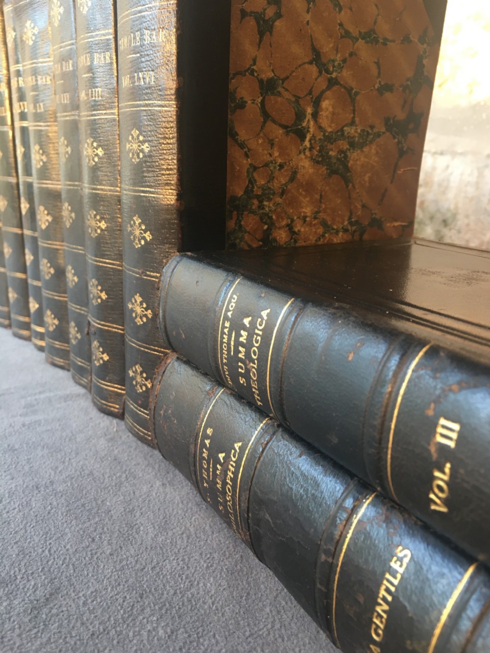 A collection of 12 leather-bound books View VIII
