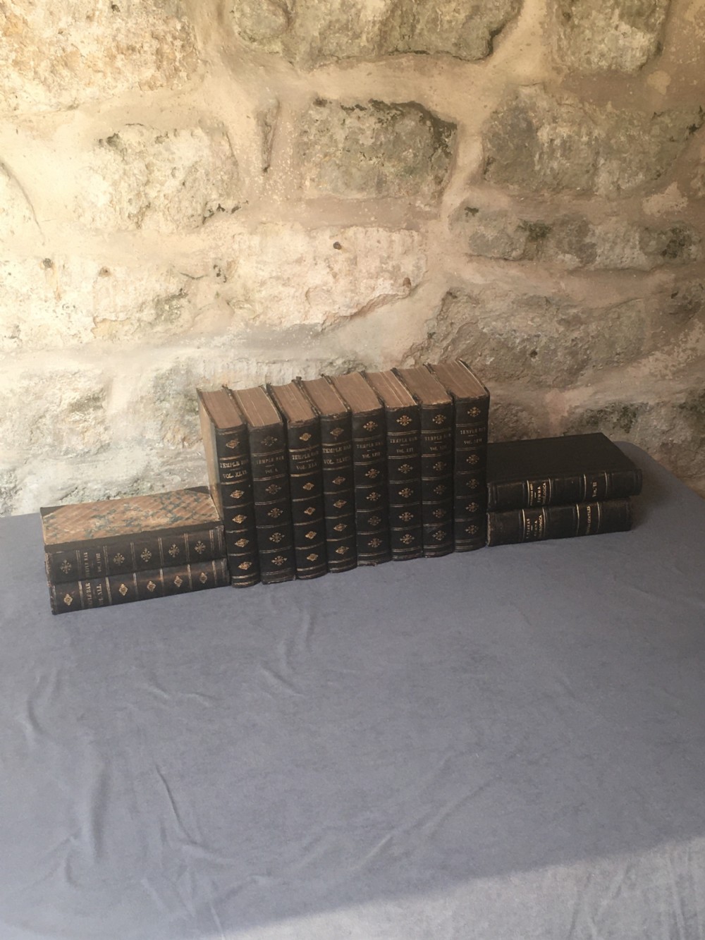 A collection of 12 leather-bound books View XI