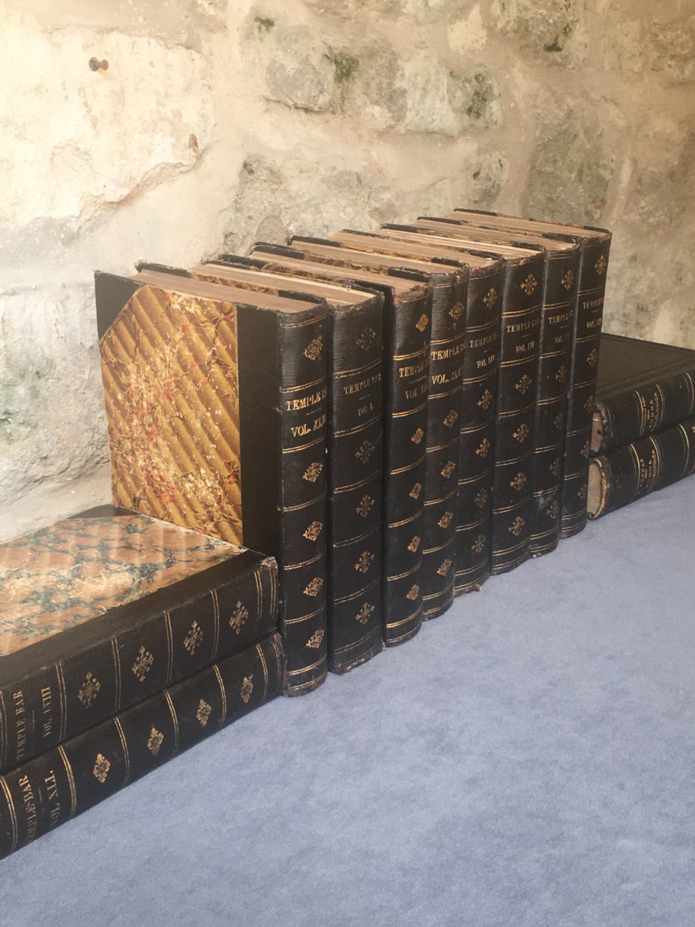 A collection of 12 leather-bound books View XV