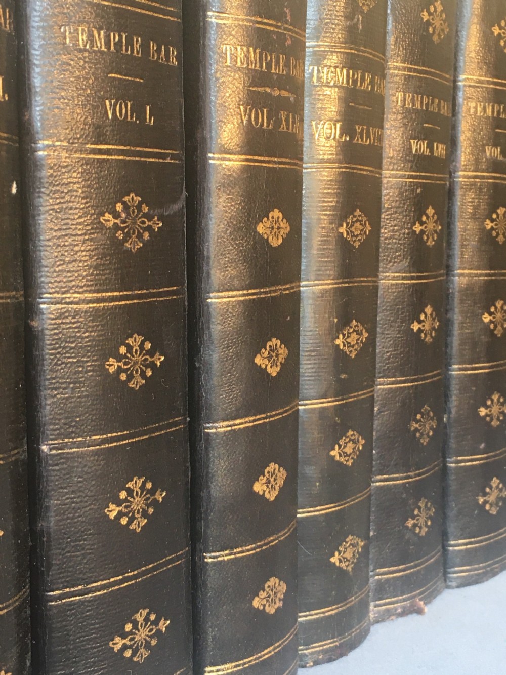 A collection of 12 leather-bound books View XVI