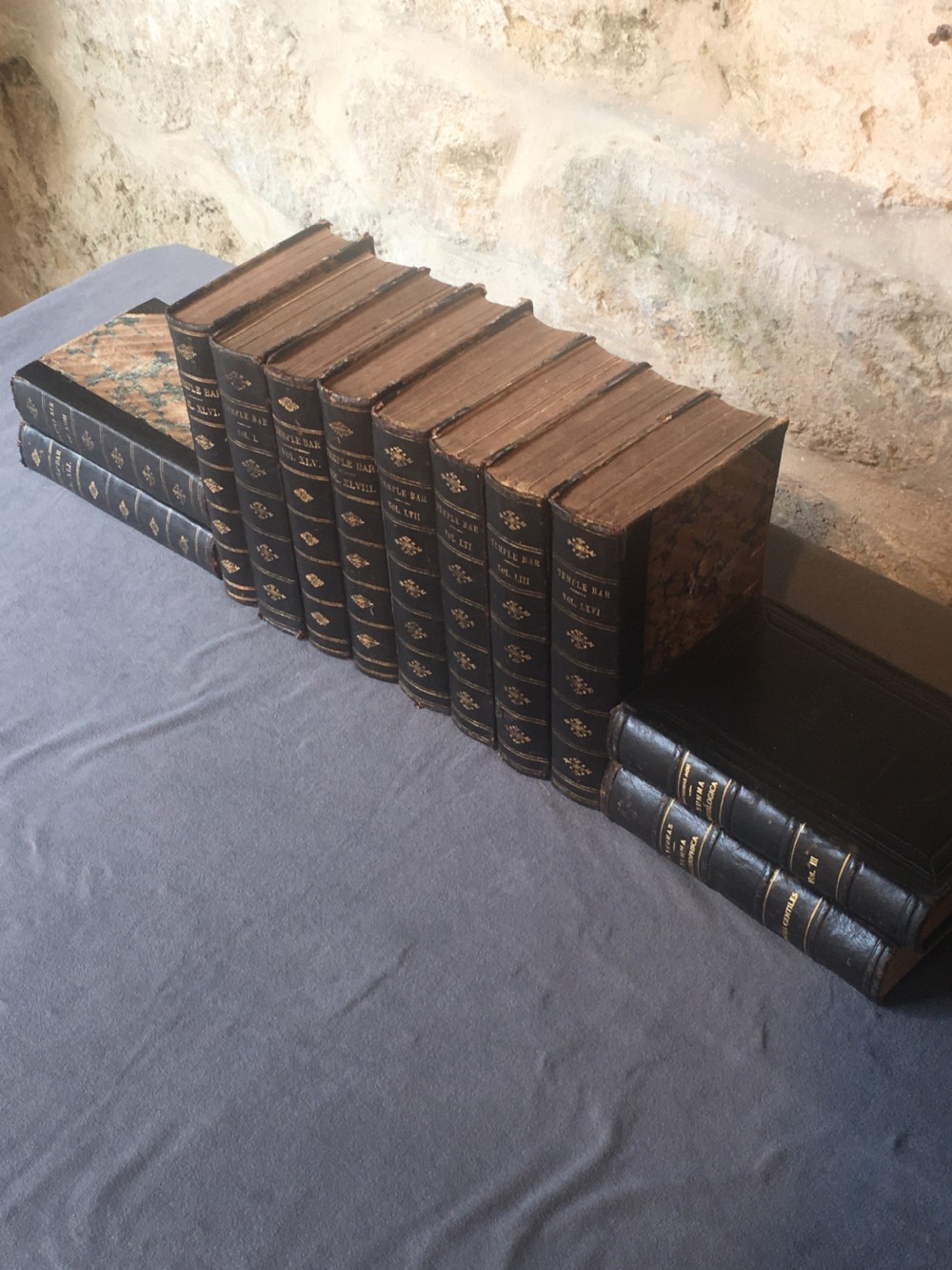 A collection of 12 leather-bound books View XVIII