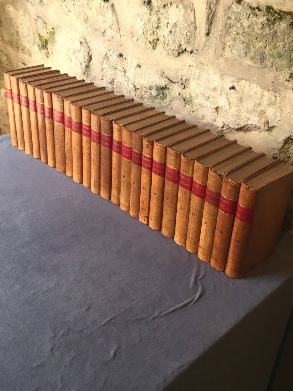 A run of 23 leather-bound books