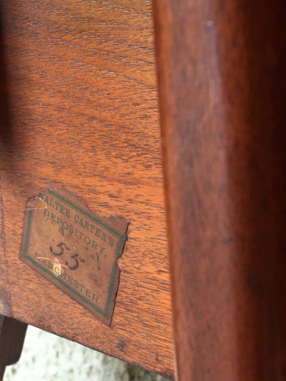 A Victorian mahogany folding occasional table with a hinged circular top supported by curved X-frame legs. View XXI