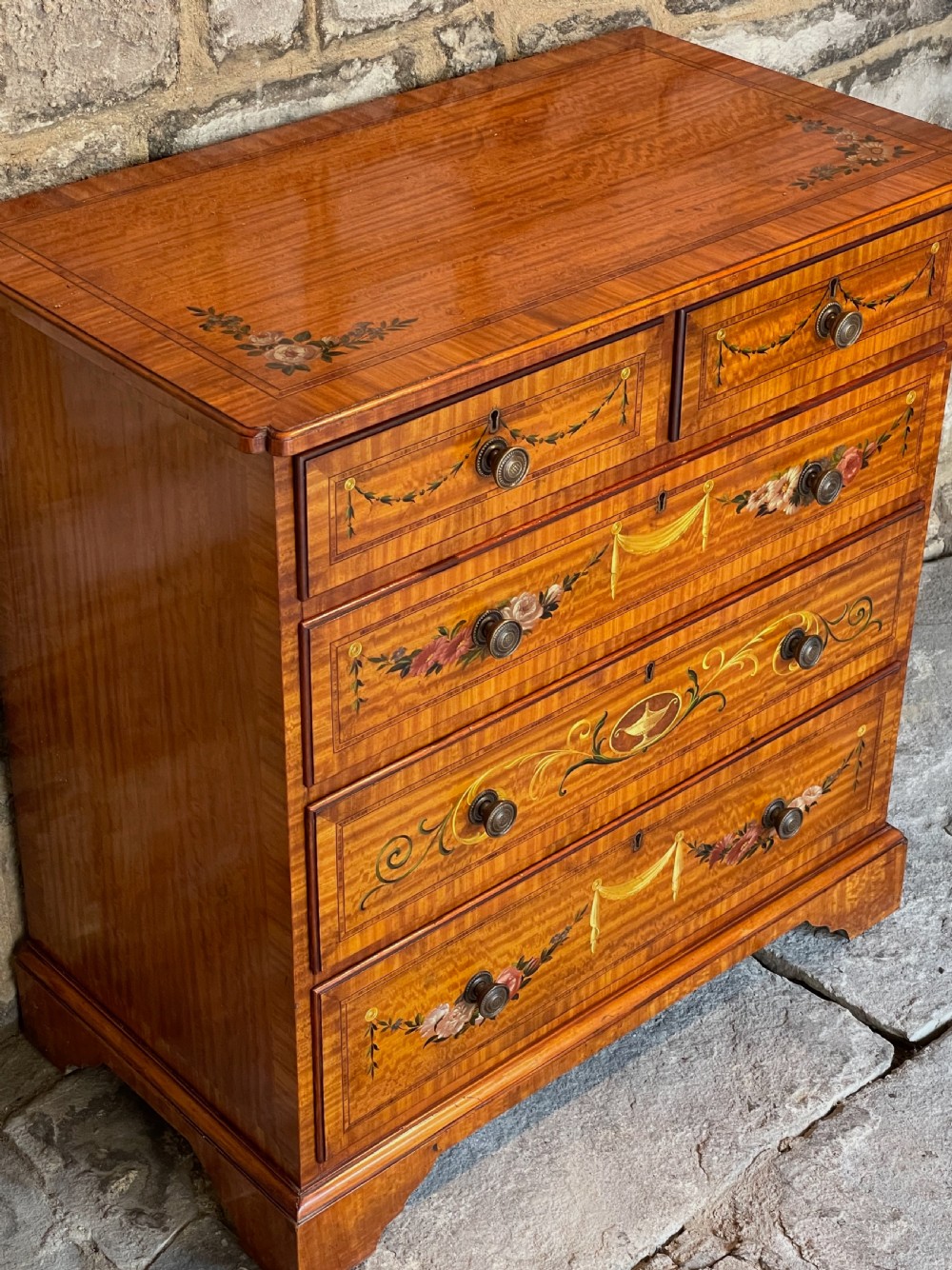 Small chest of drawers in satinwood