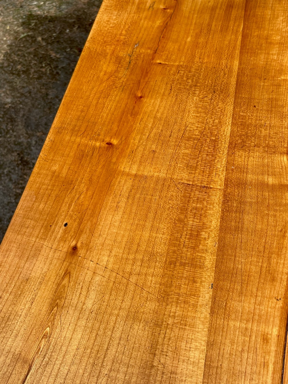A rectangular wooden refectory dining table with a plank top, breadboard ends, and four tapered legs. View VIII