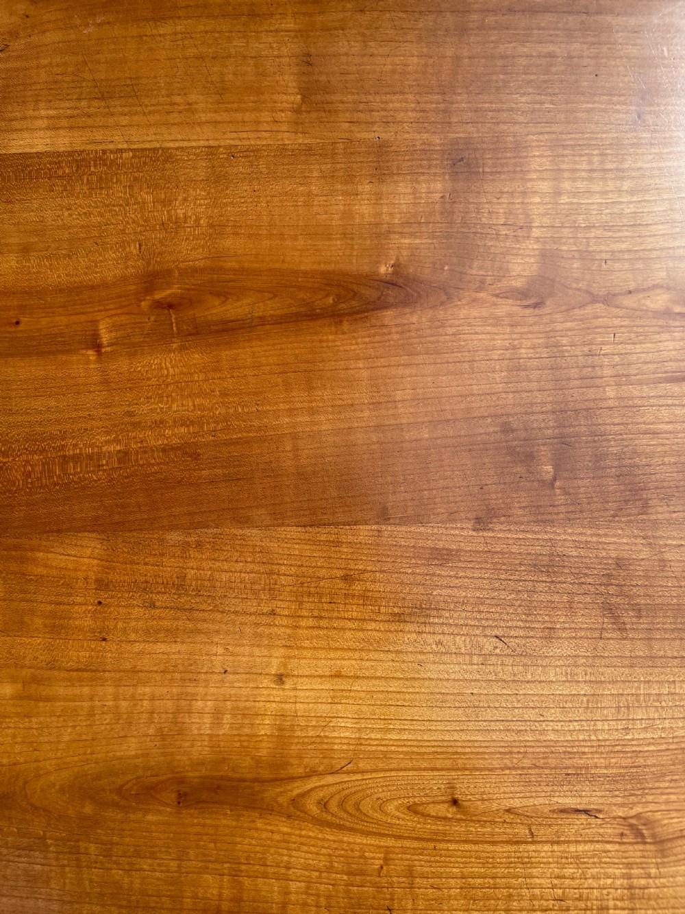A rectangular wooden refectory dining table with a plank top, breadboard ends, and four tapered legs. View XVII