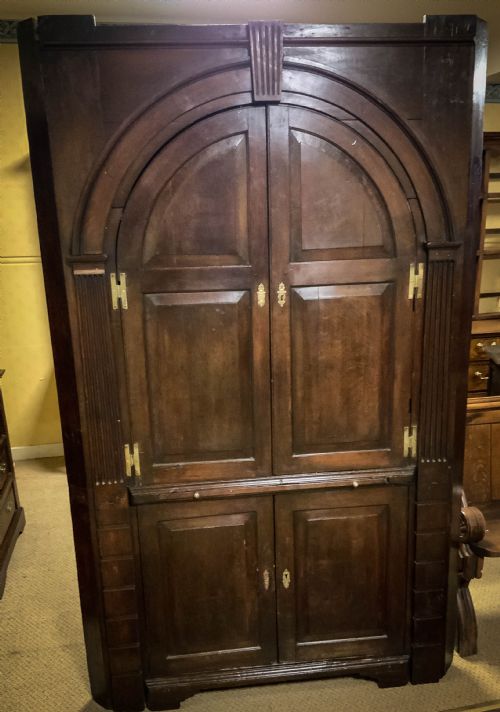 An 18th Century Full Height Corner Cupboard in Oak