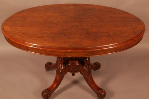 A VICTORIAN WINDOW TABLE IN BURR WALNUT