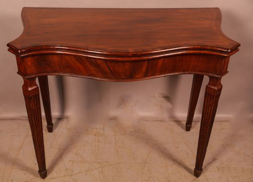 A SUPER 18TH CENTURY GAMES TABLE SERPENTINE OUTLINE C 1760