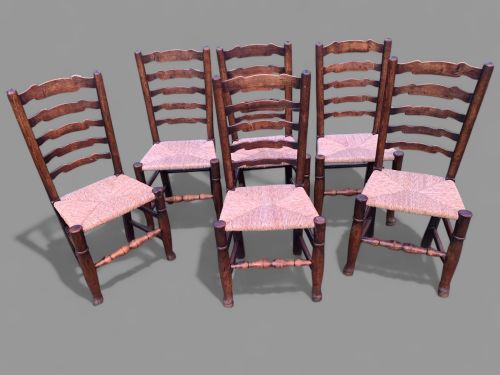 A SET OF 6 GEORGIAN LADDER BACK DINING CHAIRS