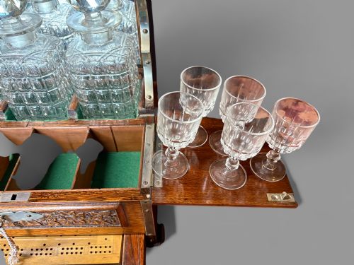 A VICTORIAN OAK CASED TANTALUS IN EXCELLENT CONDITION - ADDITIONAL PHOTO 3