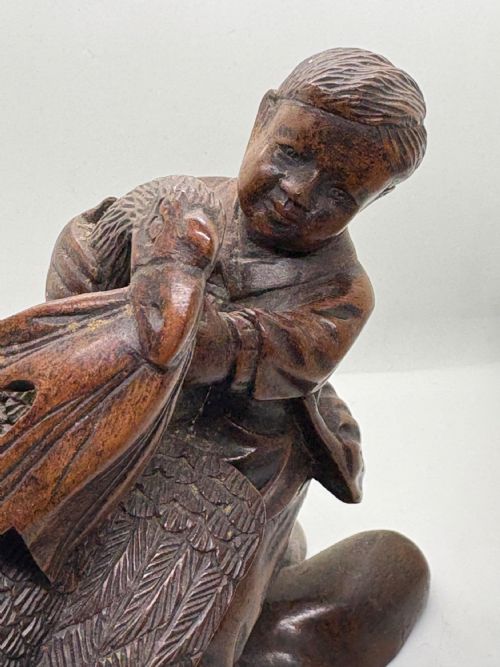 SUPERB BLACK FOREST CARVING OF BOY WITH PHOENIX - ADDITIONAL PHOTO 2