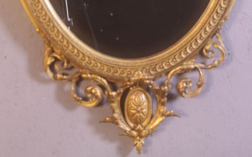 A GEORGIAN OVAL GILT FRAMED MIRROR - ADDITIONAL PHOTO 2