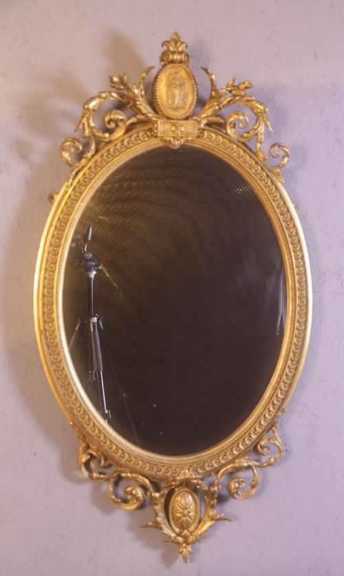 A GEORGIAN OVAL GILT FRAMED MIRROR - ADDITIONAL PHOTO 3