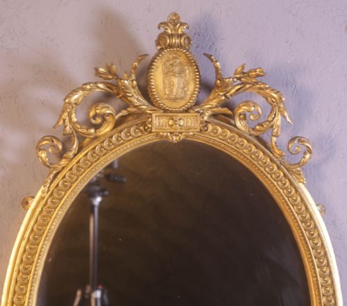 A GEORGIAN OVAL GILT FRAMED MIRROR - ADDITIONAL PHOTO 4