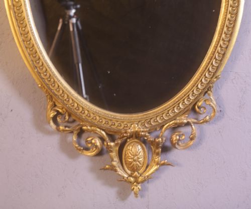 A GEORGIAN OVAL GILT FRAMED MIRROR - ADDITIONAL PHOTO 5