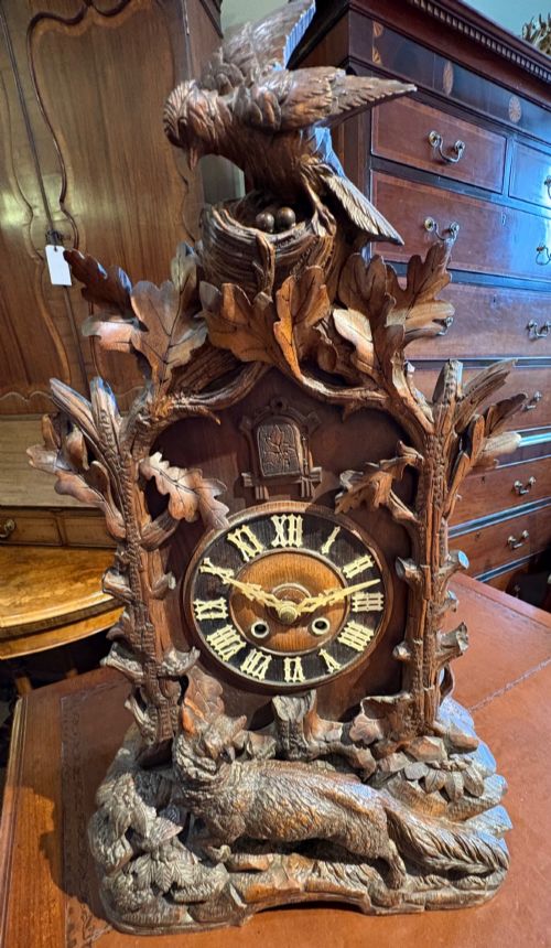 A SUPER BLACK FOREST CUCKOO CLOCK WORKING ORDER