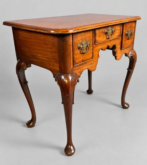 A stunning 18th century Low Boy in mahogany cabriole legs all round