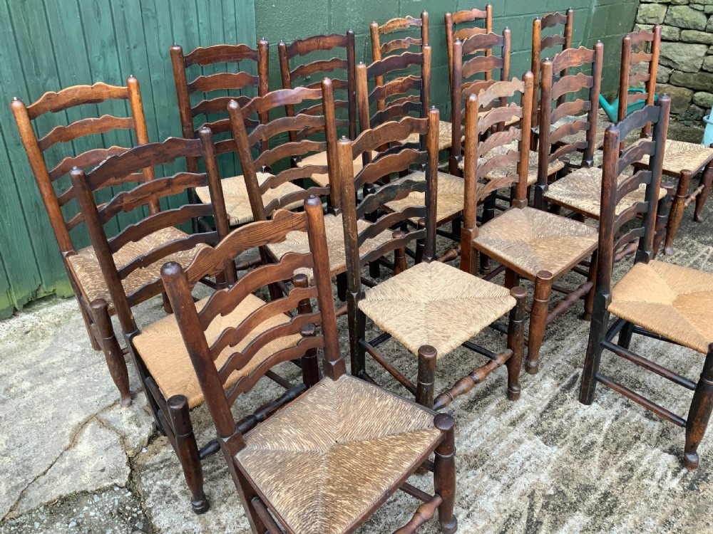A Harlequin Set of 15 19th century ladder back dining chairs View III