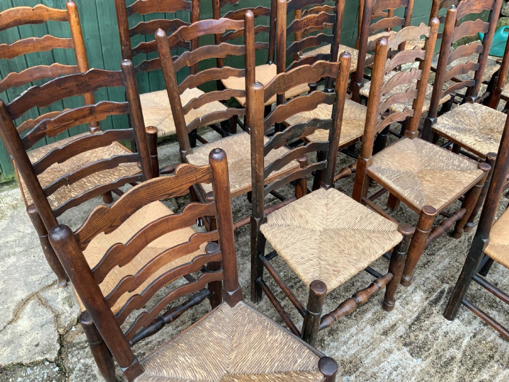 A Harlequin Set of 15 19th century ladder back dining chairs View IV