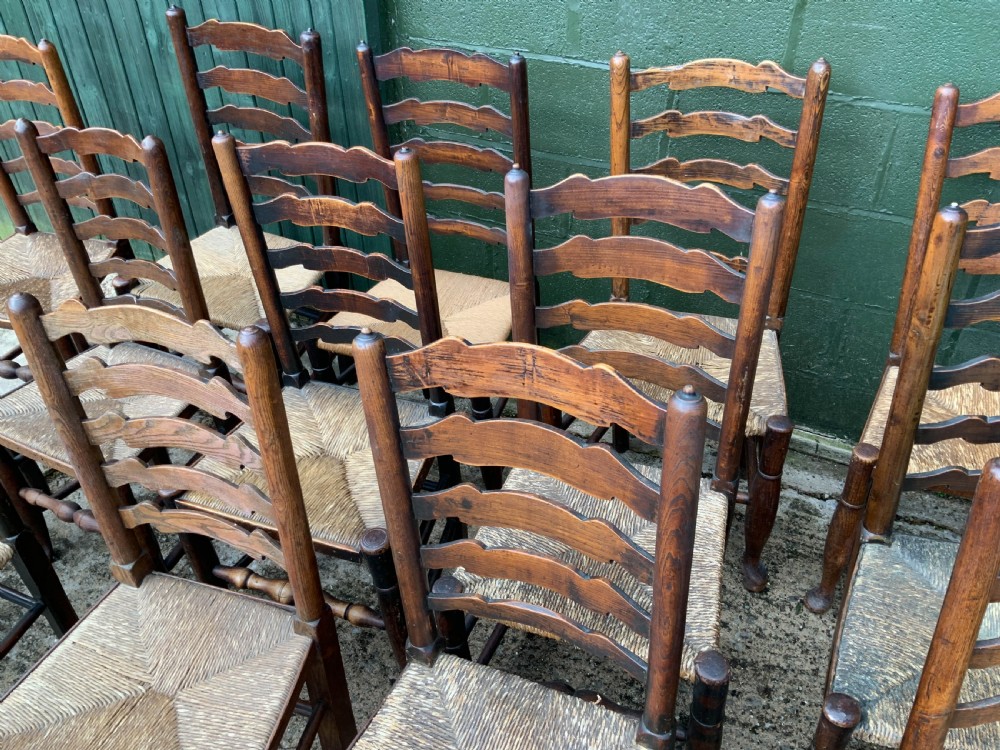 A Harlequin Set of 15 19th century ladder back dining chairs View V