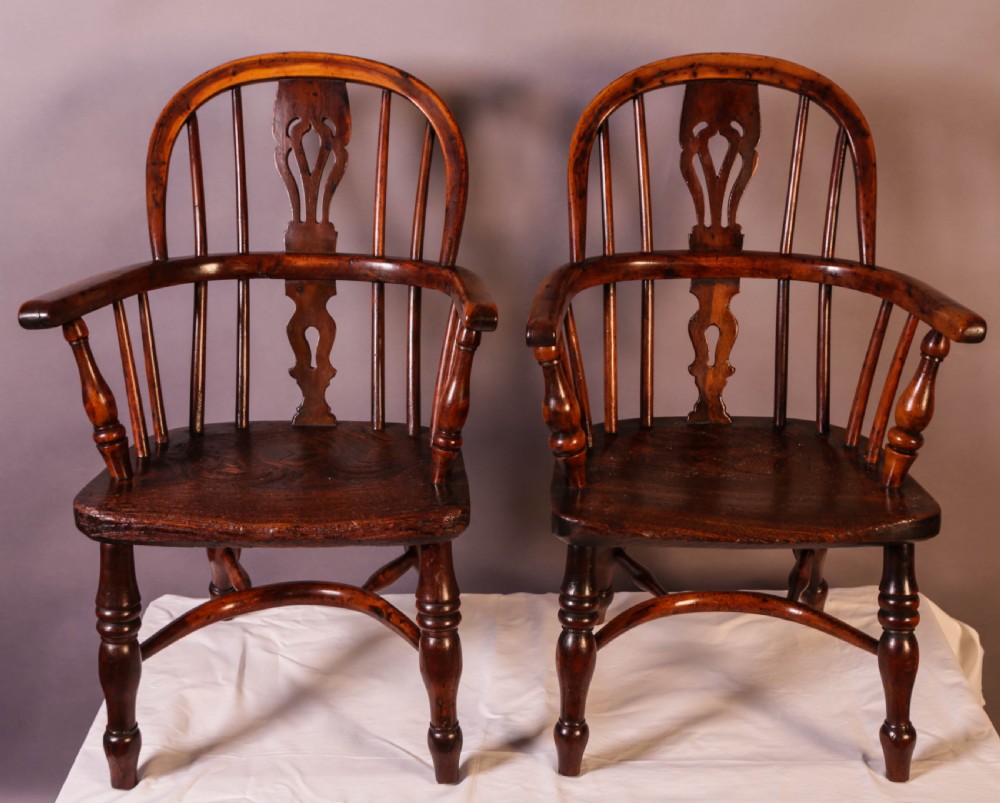 A Near Pair of Childs Yew Wood Windsor chairs