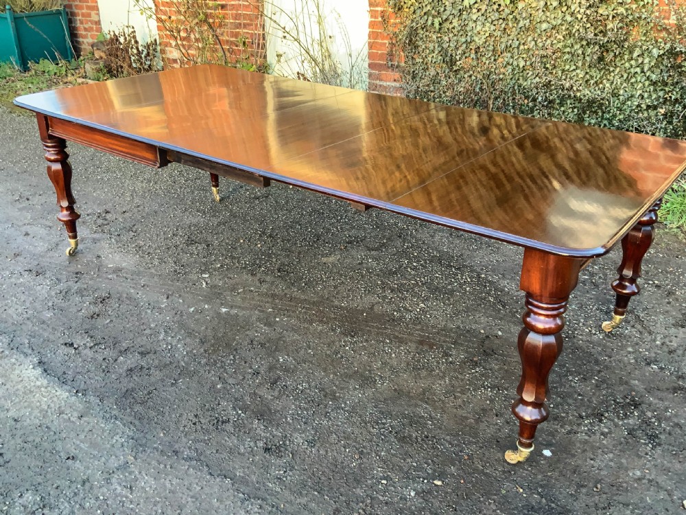 A Victorian Mahogany 3 leaf Extending Dining Table View II