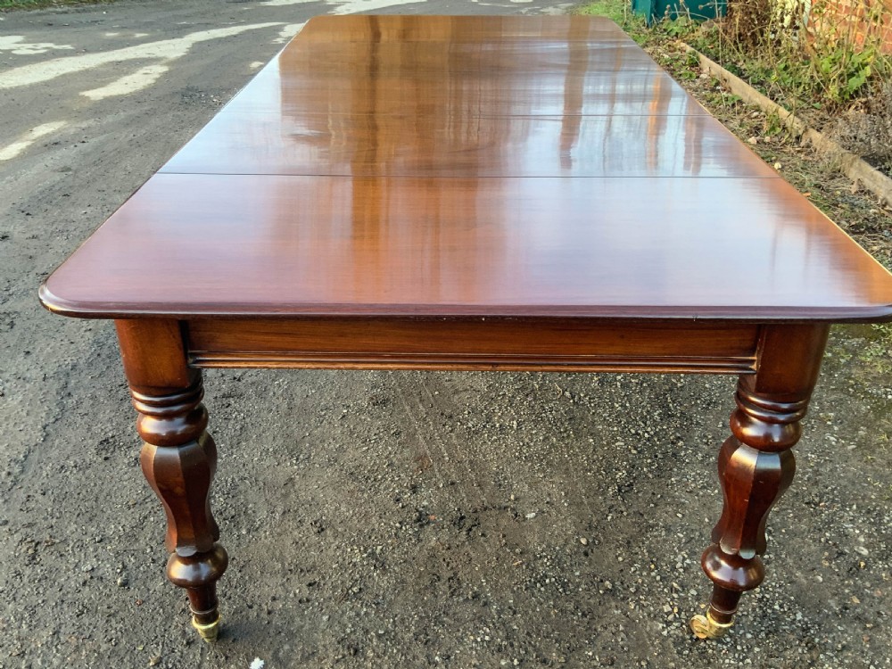 A Victorian Mahogany 3 leaf Extending Dining Table View IV