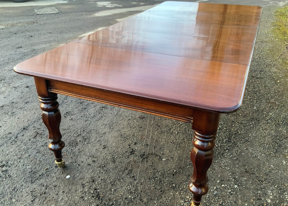A Victorian Mahogany 3 leaf Extending Dining Table View V