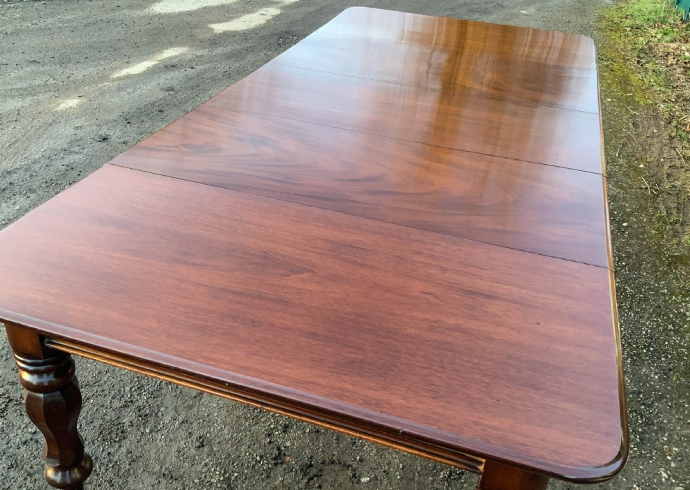 A Victorian Mahogany 3 leaf Extending Dining Table View VII