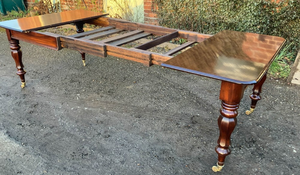 A Victorian Mahogany 3 leaf Extending Dining Table View X