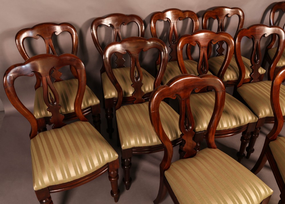 A Set of 12 Victorian Spear Point Balloon back Dining Chairs View III