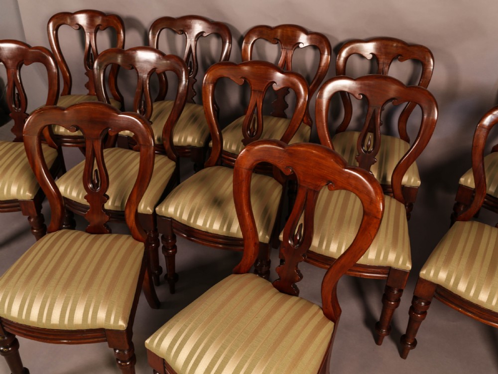 A Set of 12 Victorian Spear Point Balloon back Dining Chairs View IV