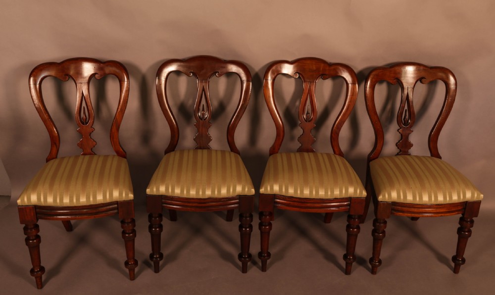 A Set of 12 Victorian Spear Point Balloon back Dining Chairs View V