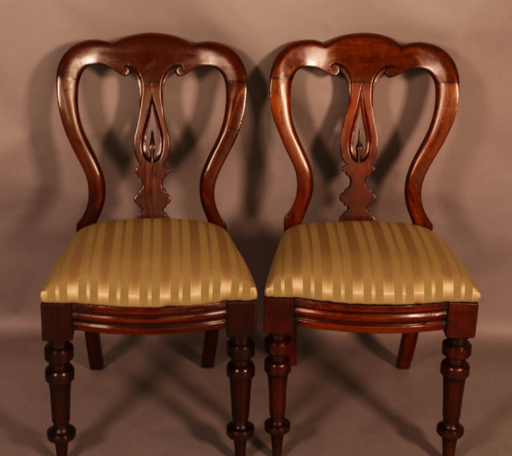 A Set of 12 Victorian Spear Point Balloon back Dining Chairs View VII