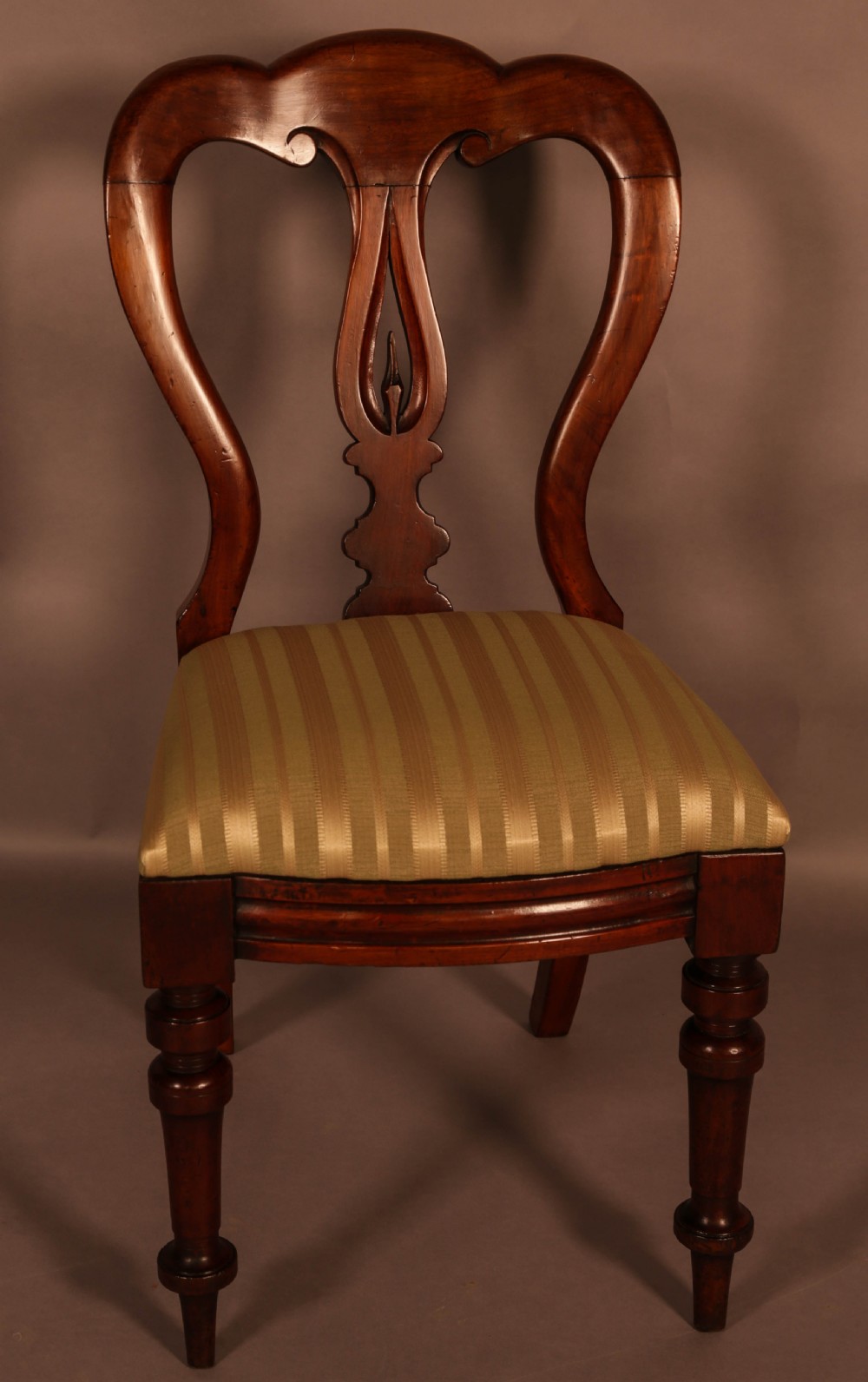 A Set of 12 Victorian Spear Point Balloon back Dining Chairs View VIII