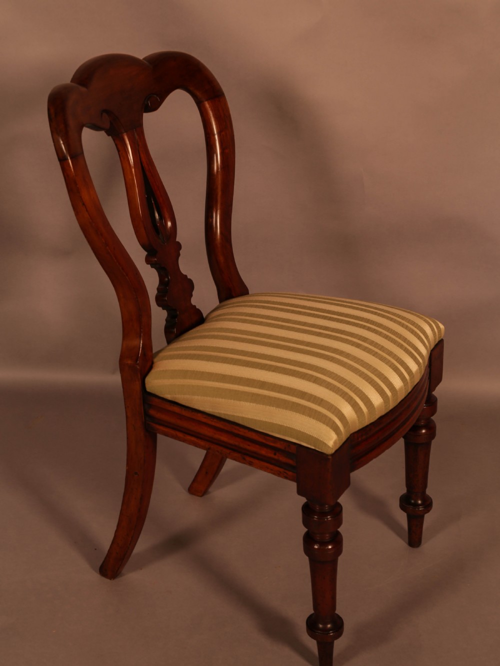 A Set of 12 Victorian Spear Point Balloon back Dining Chairs View IX