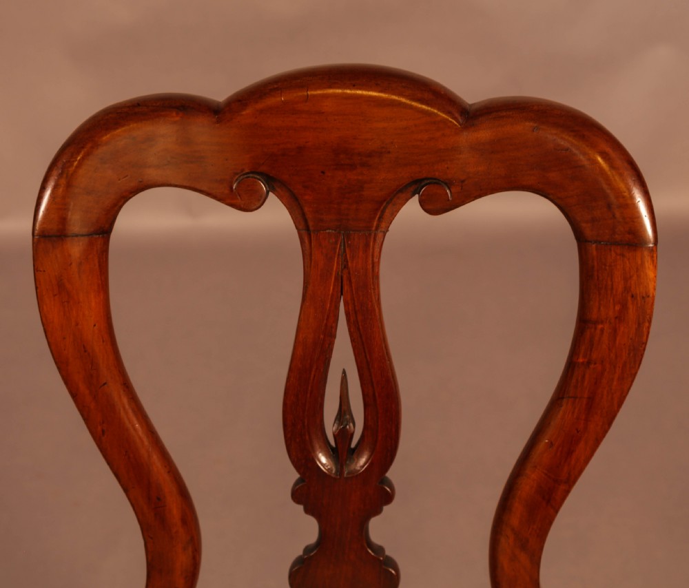 A Set of 12 Victorian Spear Point Balloon back Dining Chairs View XI