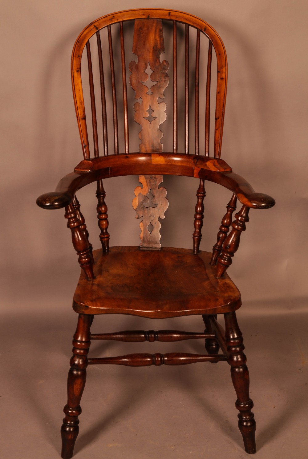 A Very rare Yew wood Broad Arm Windsor Chair Yew Seat