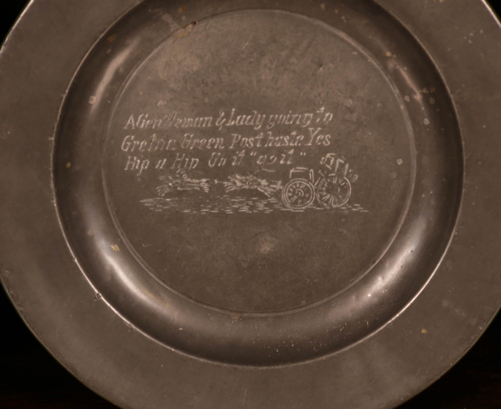 A Set of 4 pewter plates with engraved decoration View IV