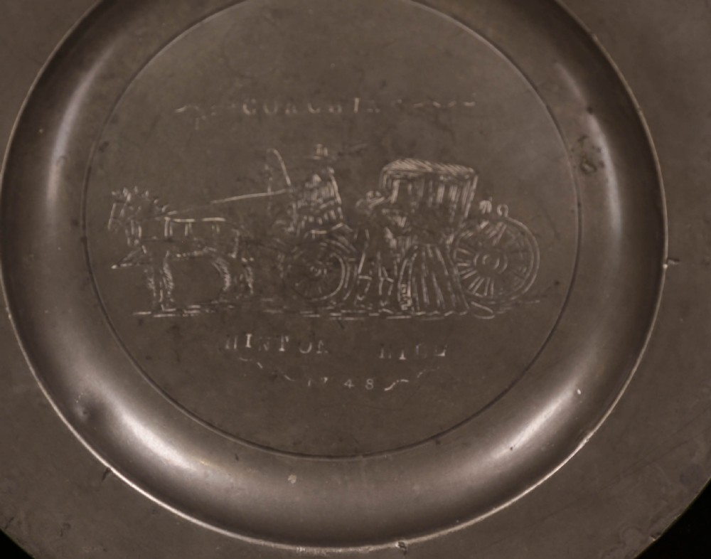 A Set of 4 pewter plates with engraved decoration View V