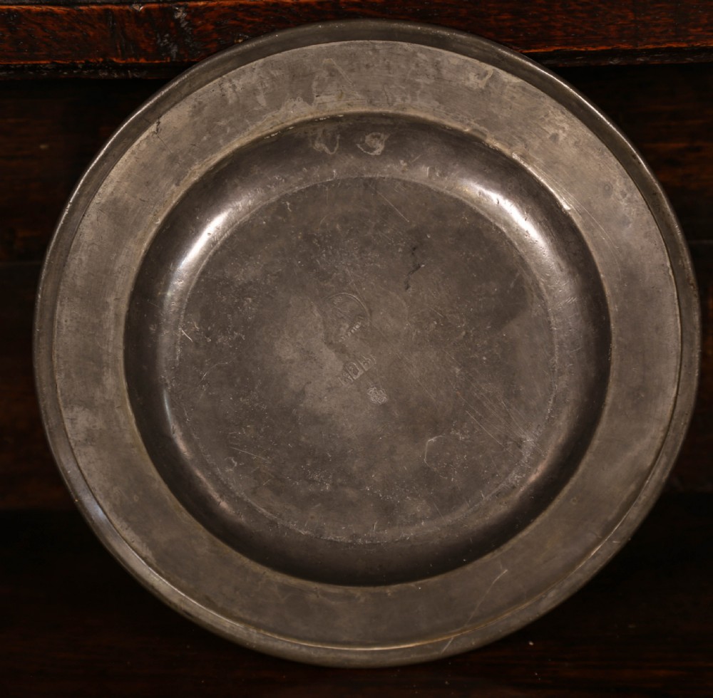 A Set of 4 pewter plates with engraved decoration View VII