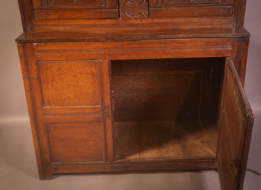 A Small 17th century Cupboard in Oak original carving View II