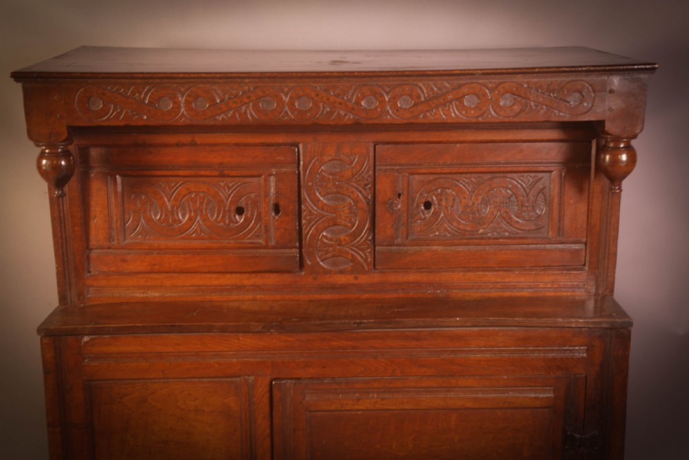 A Small 17th century Cupboard in Oak original carving View IV