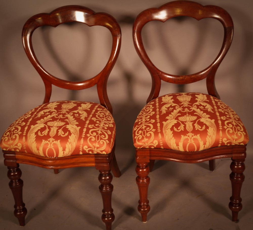 A Rare set of 16 Victorian Mahogany Balloon Back Dining Chairs View V