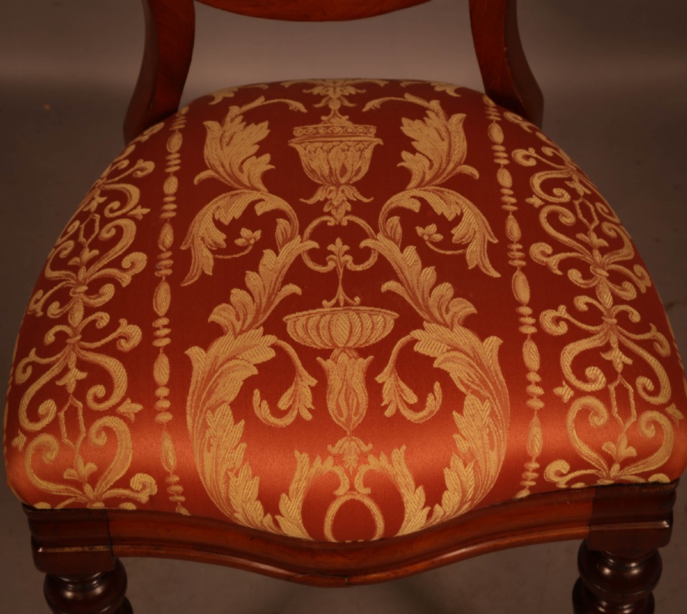 A Rare set of 16 Victorian Mahogany Balloon Back Dining Chairs View X