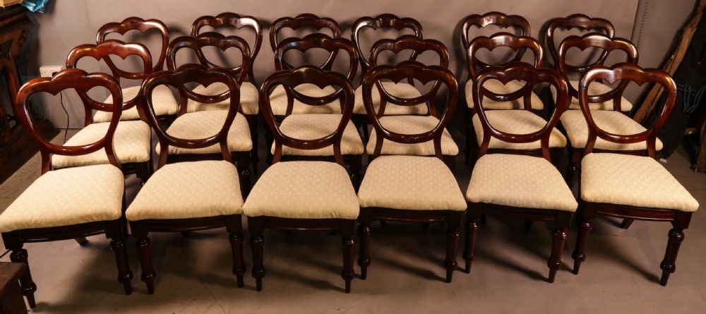 A Set of 8 Victorian Mahogany Balloon Back Dining Chairs