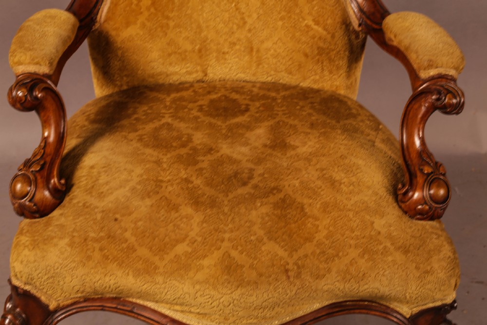 A Victorian Walnut spoon back armchair View IV