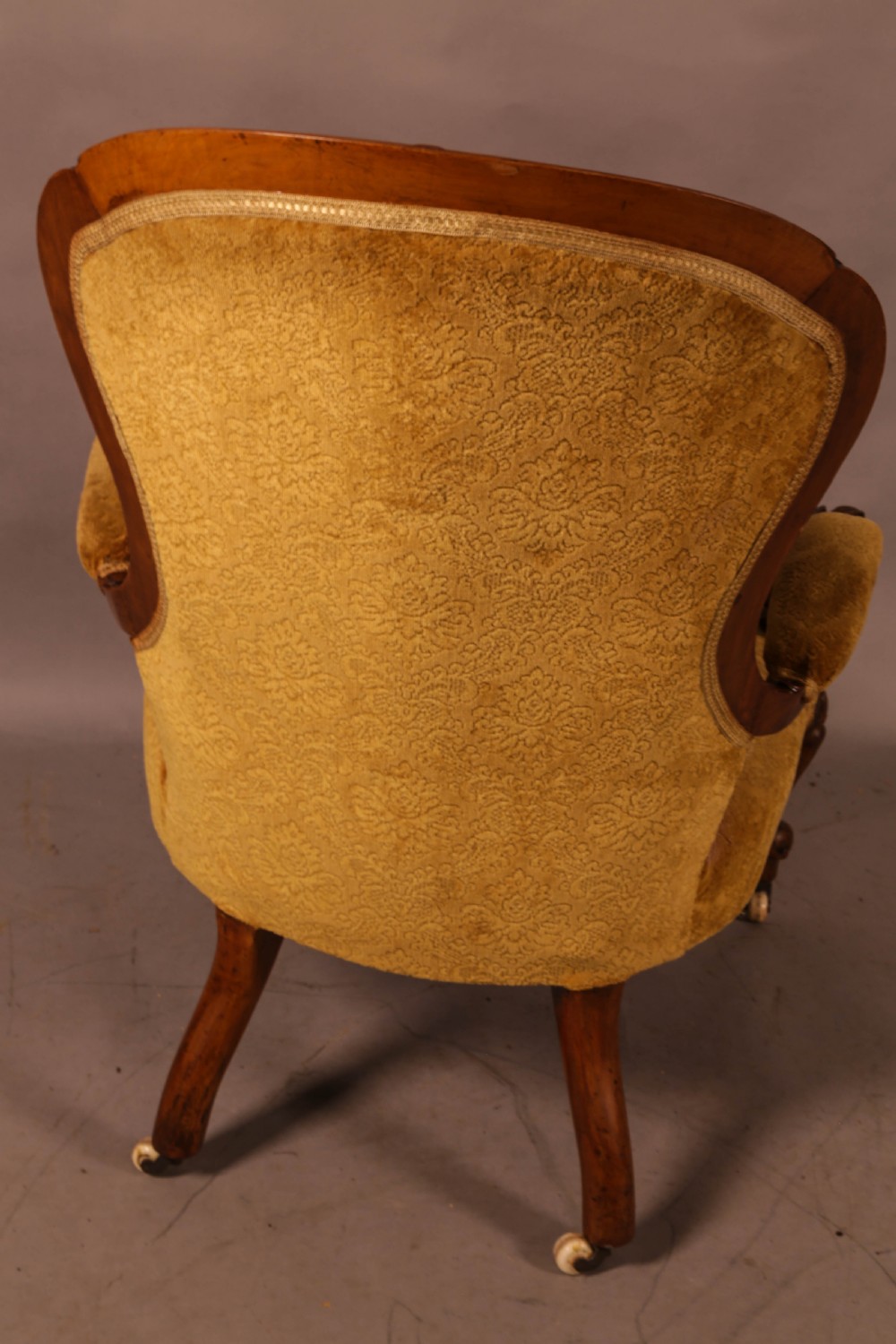 A Victorian Walnut spoon back armchair View IX