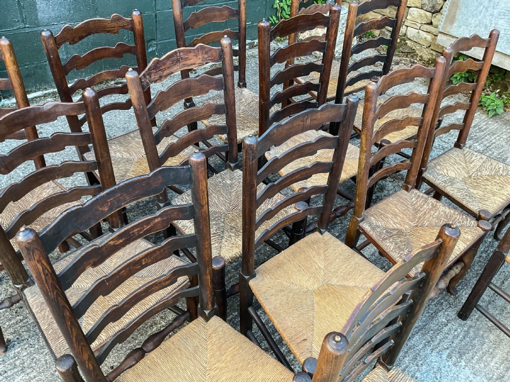 a harlequin set of 12 early 19th century ladder back chairs View V